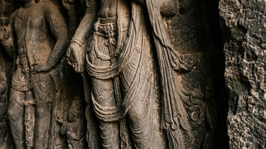 Drapery detail on Bodhisattva sculpture at Aurangabad Caves — overlooked carving detail, Cave 3, Maharashtra