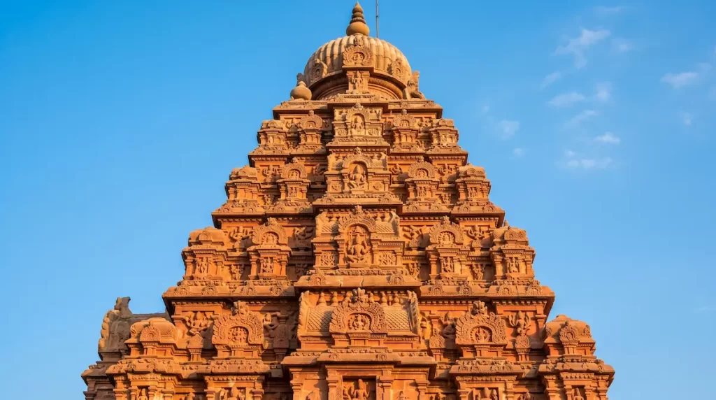 Grishneshwar Temple five-tiered shikhara — red sandstone carved tower detail, 18th century Maratha temple architecture
