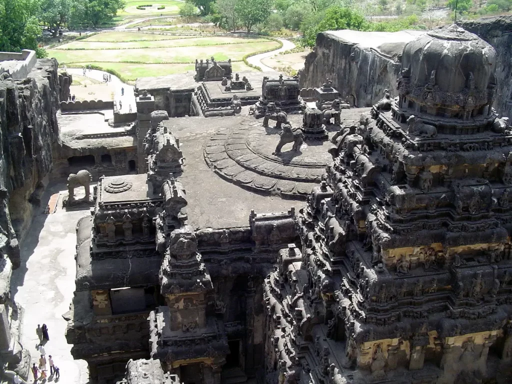 Side view of Ellora's Kailasa Temple, the rock-cut Hindu shrine carved from a single basalt cliff - Ellora Caves in one day